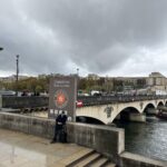 a bridge displaying the entrance of " croisieres River cruises"